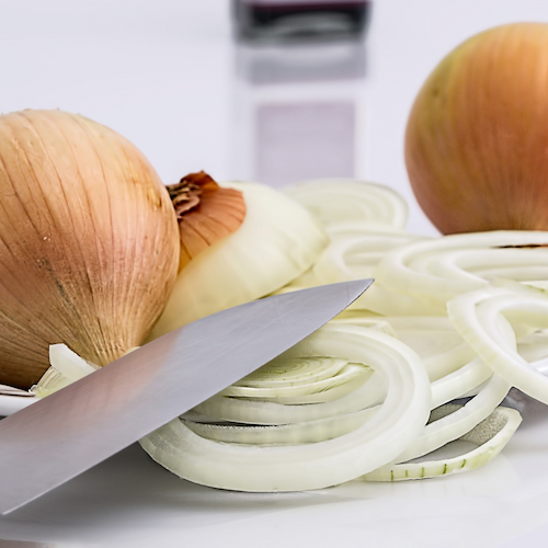 Cut up onions on a chopping board