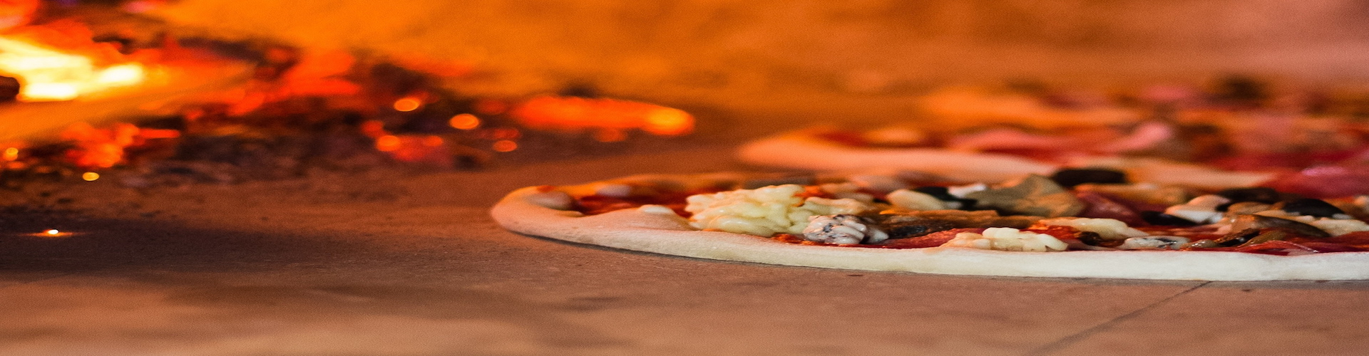 Pizza getting cooked in oven
